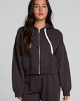 Front view of a woman wearing the Chaser Abilene Dark Heather Grey Zip Up on a neutral background