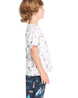 Side view of the Chaser Kids Allover Sailboats Tee in white featuring the repeating sailboat pattern across the side