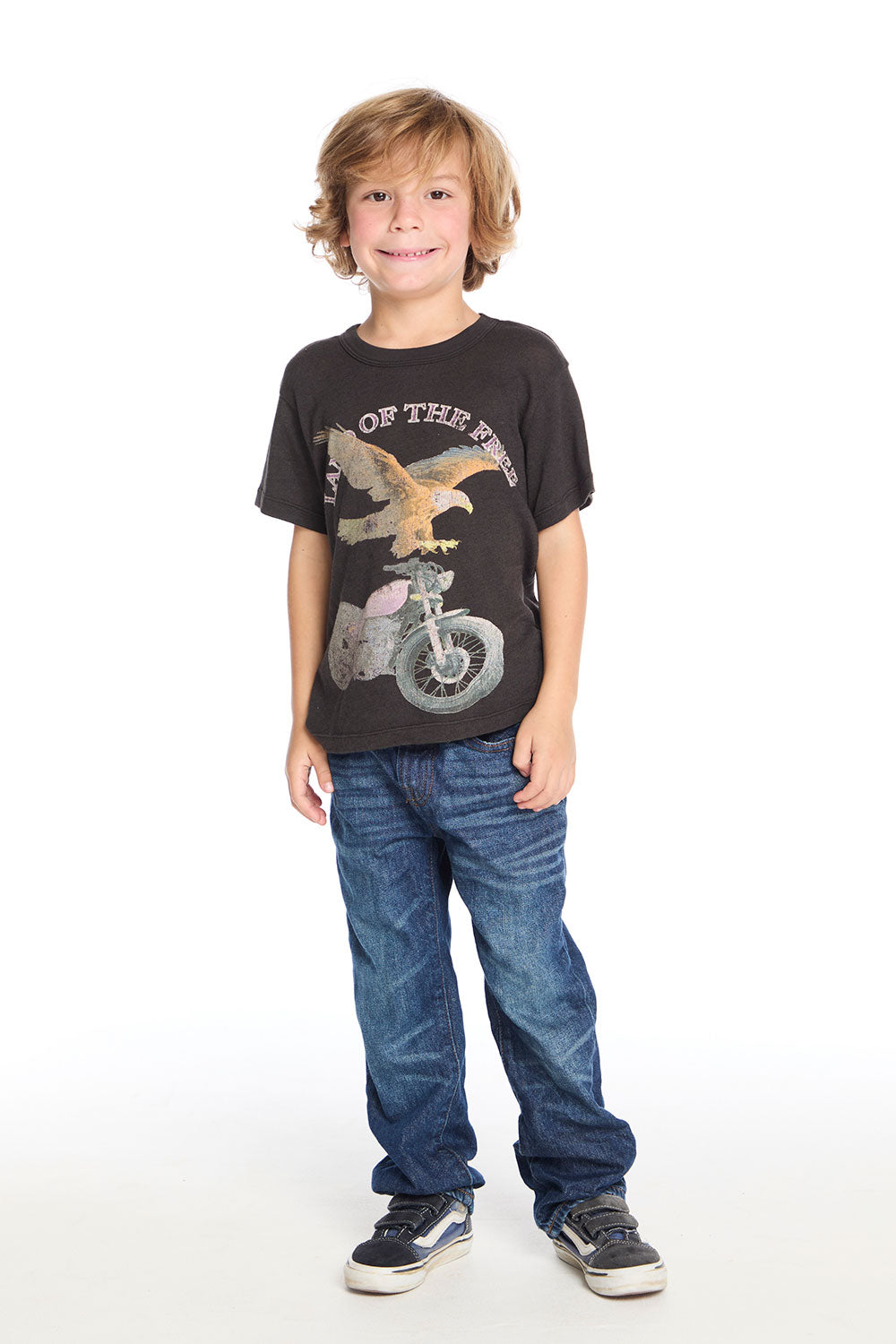 Full body view of Chaser Kids Land Of The Free Classic Tee styled with blue jeans for a cool retro-inspired outfit