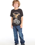 Full body view of Chaser Kids Land Of The Free Classic Tee styled with blue jeans for a cool retro-inspired outfit