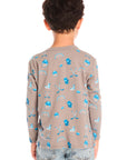 Back view of boy wearing Chaser’s Hockey Champ patterned long-sleeve top against a white background