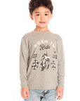 Front view of boy wearing Chaser’s Off To The Races grey long sleeve top with motorcycle and race flag graphic and “Born to Ride” text against a white background