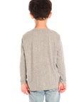 Back view of boy wearing Chaser’s Tom Petty Live On Tour gray long-sleeve top and light blue jeans on a white background