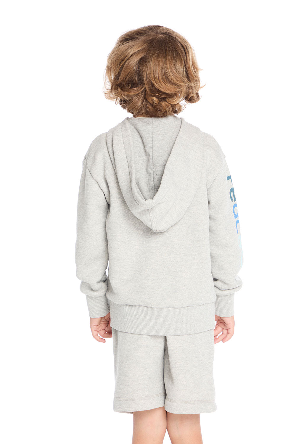Back view of boy wearing Chaser Kids Peace Out Zip Up Hoodie with hood down, Heather Grey color, white background