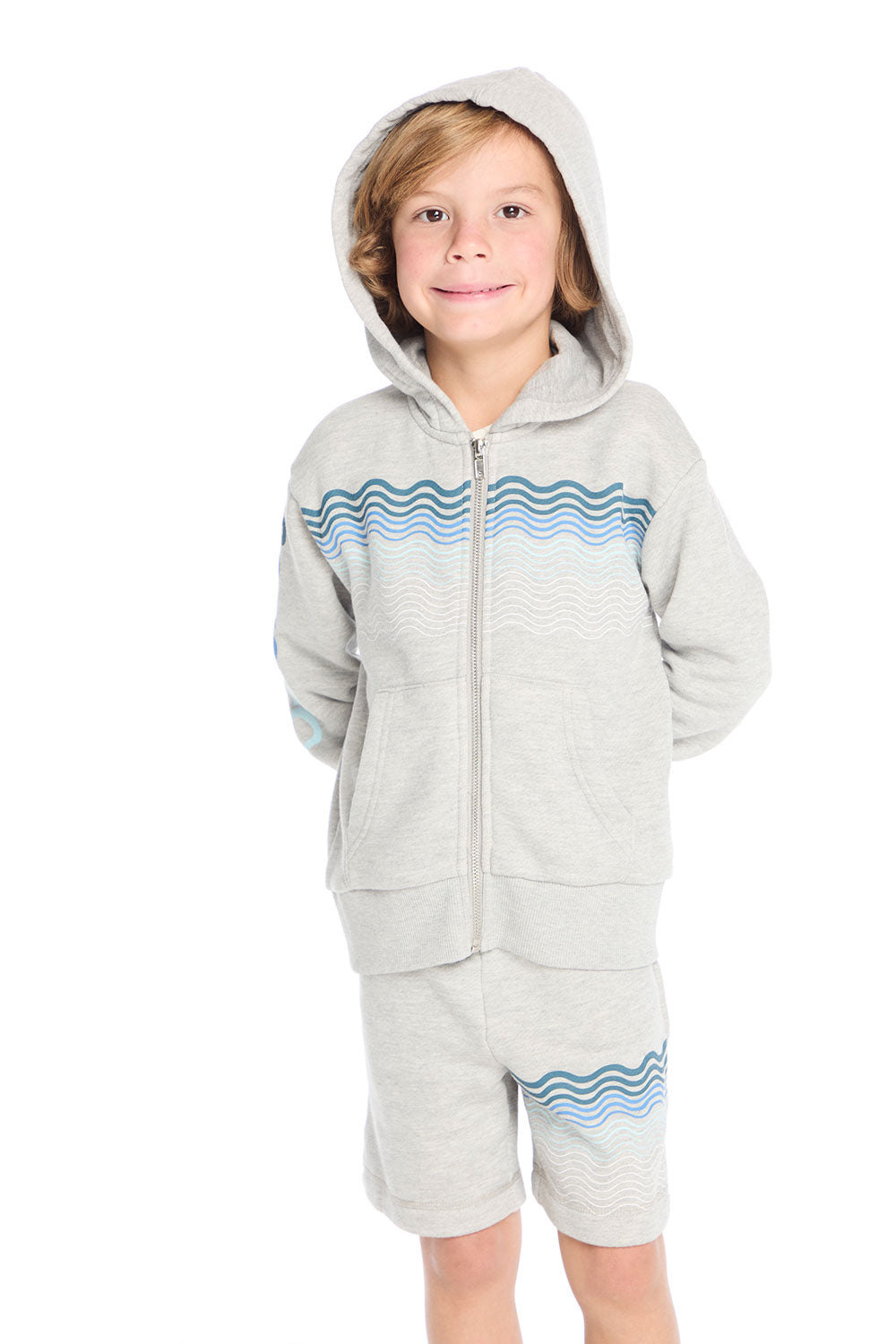 Boy wearing Chaser Kids Peace Out Zip Up Hoodie in Heather Grey with hood up and blue wavy stripe detail, white background