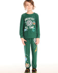 Full body view of boy wearing Chaser’s Greatest Of All Time Everest Green pants with matching long sleeve top on a white background