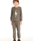 Full body view of boy wearing Chaser’s Bolt safari green long sleeve top with lightning bolt design and matching pants on a white background.