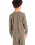 Back view of boy wearing Chaser’s Safari Green Champions Racing Team long sleeve top with matching pants on a white background