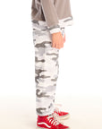 Side view of boy wearing Chaser’s Camo Pants in gray camouflage on a white background.