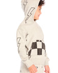 Side view of boy wearing Chaser’s Blocked Checkered Bolts light gray hoodie with hoodie up with checkered pattern and lightning bolt designs on a white background