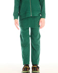 Front view of boy wearing Chaser’s Everest Green Knee Seam Jogger with knee seam detail on a white background