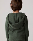 Model wearing Chaser's Lime Stripe Boys Zip-Up Hoodie in leafy green with striped detailing, back view