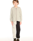 Full body view of boy wearing Chaser’s Heather Grey Zip Up Hoodie with waffle texture and color-blocked pants on a white background