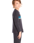 Side view of boy wearing Chaser’s Raglan Avalon Blue Pullover top with strappings and blue stripes across the chest on a white background