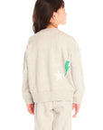 Back view of girl wearing Chaser’s light gray Winter Love Stitches Long Sleeve with colorful designs on a white background