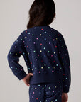 Model wearing Chaser's Festive Lights Girls Pullover in Avalon with distinctive graphic and design details, additional view