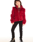 Full body view of girl wearing Chaser’s Puff Sleeve Rouge Jacket with black jeans and boots on a white background