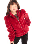 Girl wearing Chaser’s Puff Sleeve Rouge Jacket on a white background