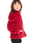 Side view of girl wearing Chaser’s Puff Sleeve Rouge Jacket on a white background