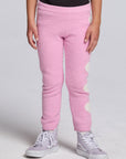 Chaser Kids Holiday Hug Girls Pants in pink with ribbed cuffs, front view on a model against a light gray studio background