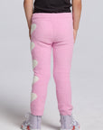 Chaser Kids Holiday Hug Girls Pants in pink, rear view on a model against a light gray studio background