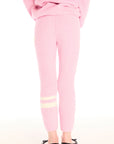 Back view of girl wearing Chaser’s pink Slim Confetti Legging on a white background