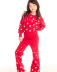 Full body view of girl wearing Chaser’s Tara Rouge Leggings with star patterns and matching Danni Rouge Pullover on a white background