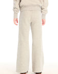 Back view of girl wearing Chaser’s Tara Heather Grey Leggings with matching Danni Pullover on a white background