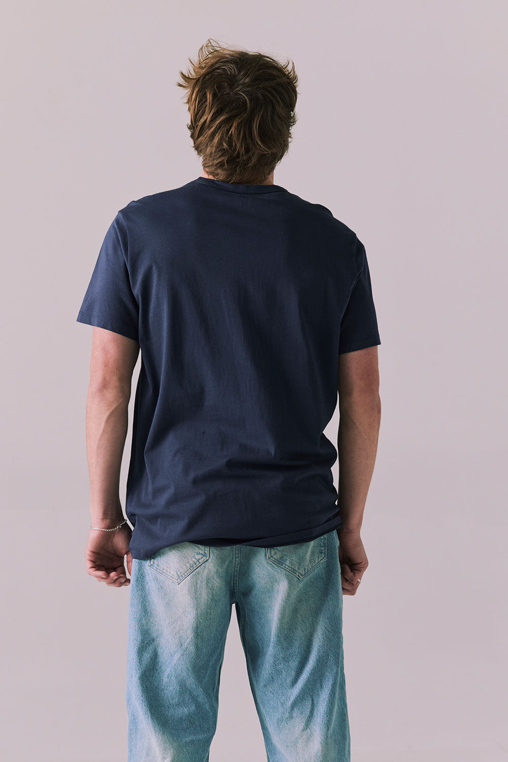 Back view of soft cotton Halftime 1984 tee in navy.