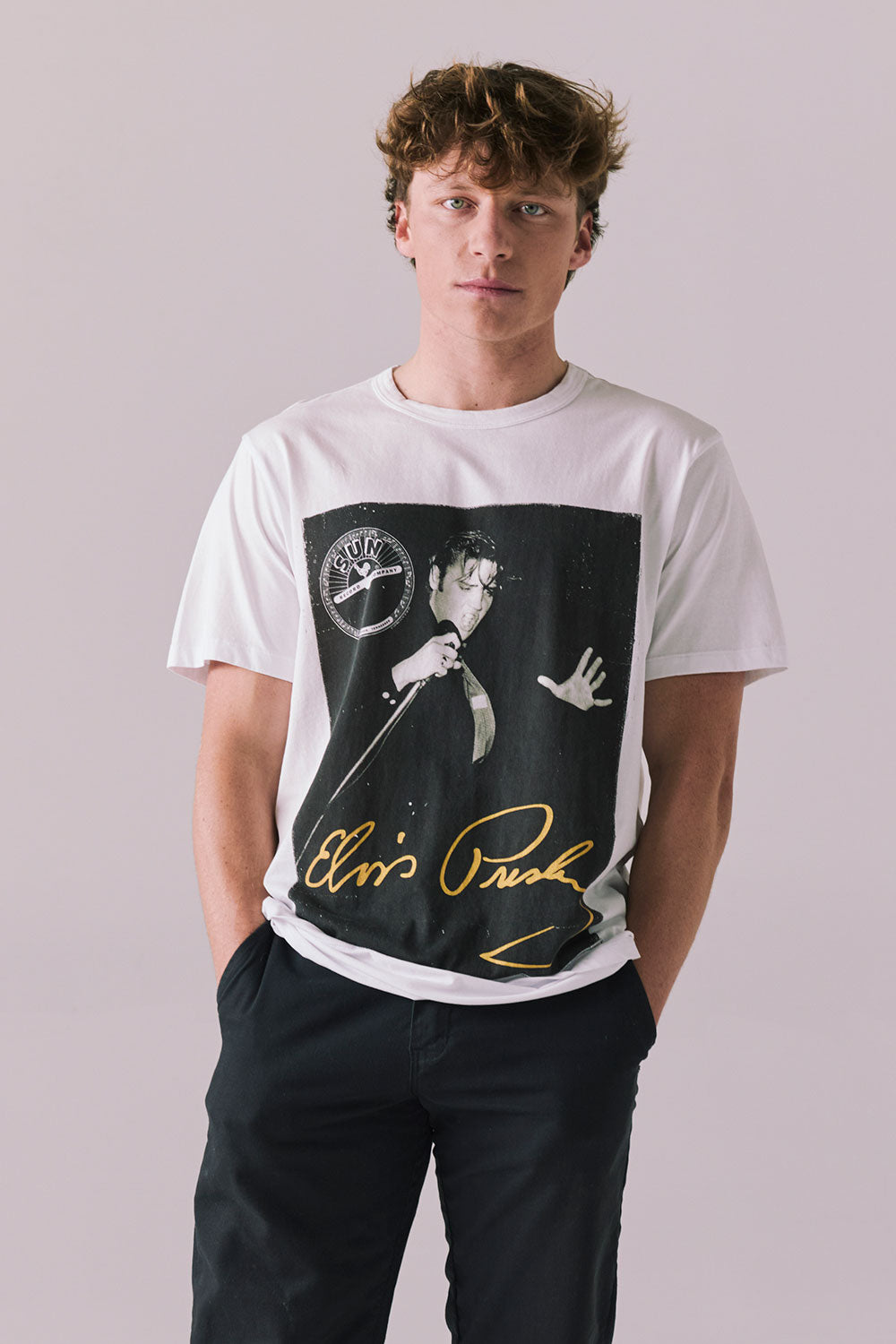 Front view of Elvis Live Portrait tee in white with Sun Records artwork.