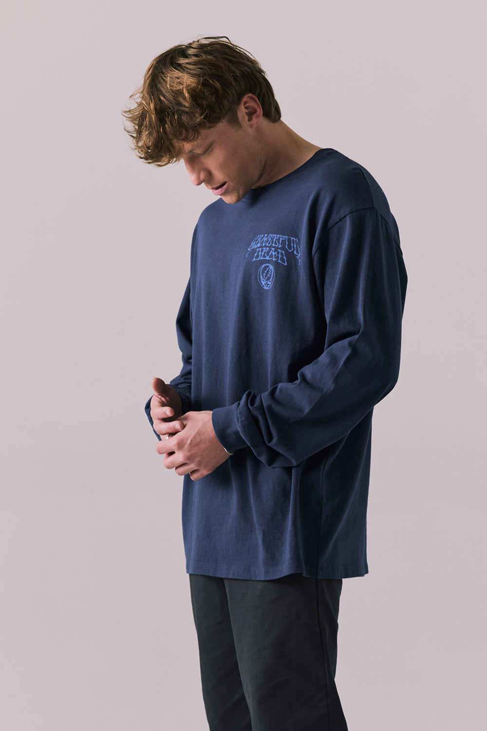 Side view of Grateful Dead Deadhead tee showing blue Stealie graphic on chest.