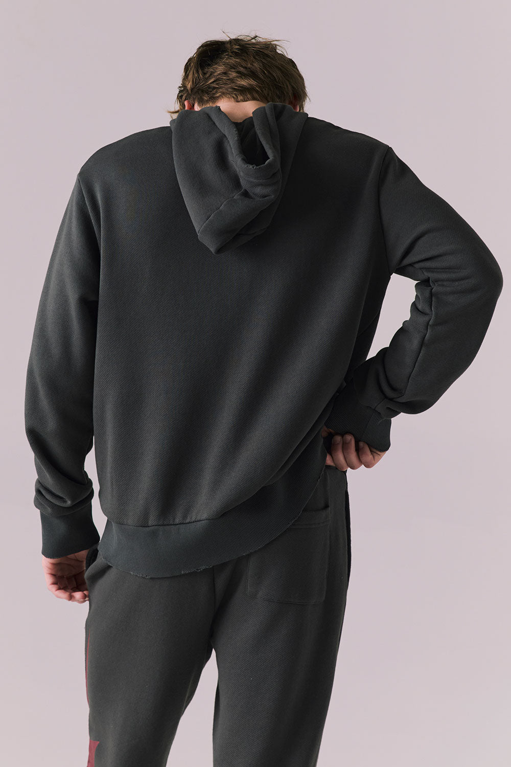 Back view of Bolt Black Hoodie with clean tonal finish.