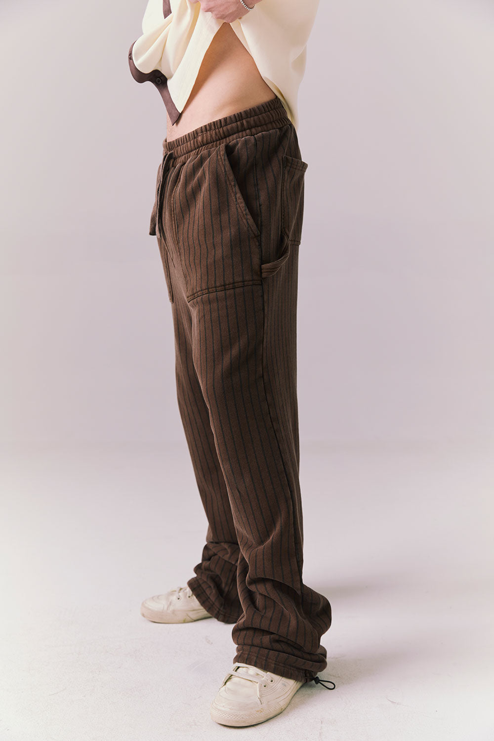 Side angle of Pinstripe Pants showing tapered leg and vintage stripe.