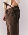 Side angle of Pinstripe Pants showing tapered leg and vintage stripe.