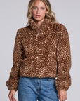 Model wearing Chaser's Baby Deer Puff Sleeve Jacket in warm brown spotted faux-fur texture with oversized puff sleeves, front view