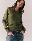 Front view of Varsity Star Sweater in bronze green with slouchy fit and twin arm stripes against a plain background