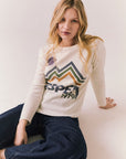 Full body view of model in Aspen 1979 Long Sleeve in white