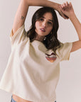 Front view of Lake Tahoe Ombre Tee in starry white with soft gradient fade, heart-shaped graphic design, and relaxed silhouette on a plain background