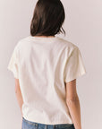Back view of Lake Tahoe Ombre Tee in starry white with soft gradient fade, heart-shaped graphic design, and relaxed silhouette on a plain background