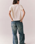 Back full front view of Lake Tahoe Ombre Tee in starry white with soft gradient fade, relaxed silhouette and blue jeans on a plain background