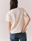 Back view of Rambler Starry White Tee with ringer neck and cap sleeves on a plain background