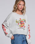 Model wearing Chaser's Rolling Stones Tattoo You Pullover in Heather Grey with colorful Rolling Stones Tattoo You artwork and red sleeve graphics, angled view
