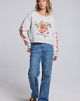 Model wearing Chaser's Rolling Stones Tattoo You Pullover in Heather Grey with colorful Rolling Stones Tattoo You artwork and red sleeve graphics, full-body view