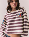 Front view of The Rolling Stones Rugby Stones Logo Long Sleeve with red and white stripes, cropped fit, and tongue logo graphic against a plain background