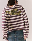 Back view of The Rolling Stones Rugby Stones Logo Long Sleeve with red and white stripes, cropped fit, and Rolling Stones graphic against a plain background