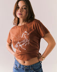 Whiskey brown graphic tee with horse line art and vintage font.