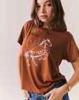 Side view of Wild Horses tee showing color tone and hemline.