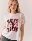 White graphic tee with flaming Guns N’ Roses logo and floral artwork.