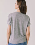 Back view of woman wearing Chaser’s Streaky Grey Love Tee on a white background