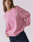 Chaser Best Mom Long Sleeve styled with denim showing relaxed silhouette and drop shoulders